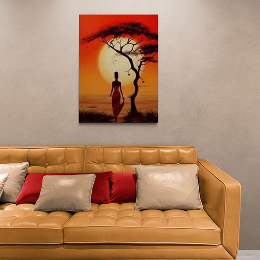 Cuadro decorativo de silueta femenina con árbol en atardecer africano en tonos cálidos naranja y rojo