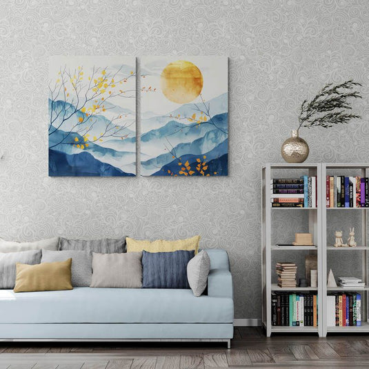 Cuadro decorativo minimalista de paisaje montañoso azul con ramas doradas y sol en acuarela