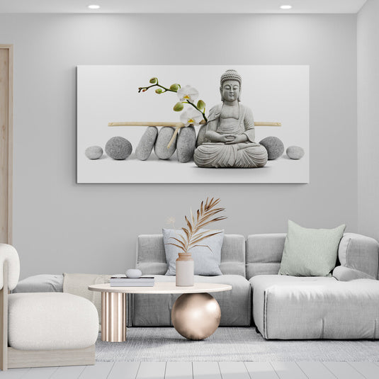 Buda con piedras zen y orquídeas blancas
