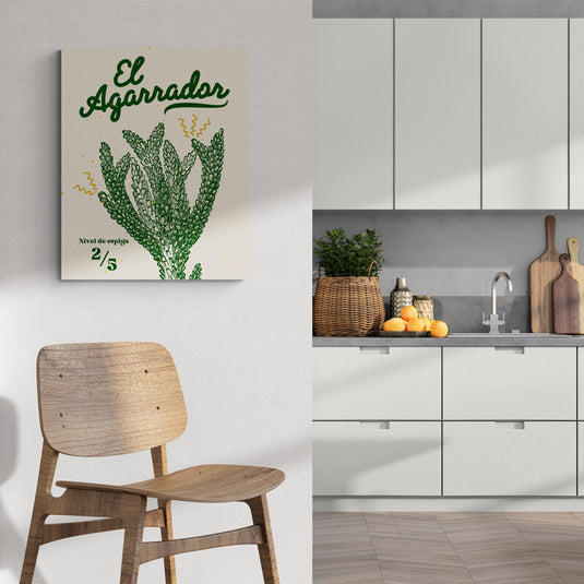 Cuadro decorativo con fondo amarillo pálido, frase 'el agarrador' en verde y siluetas de espigas en tonos verdes en la parte inferior