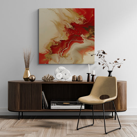 Cuadro abstracto en rojo y dorado sobre consola de madera