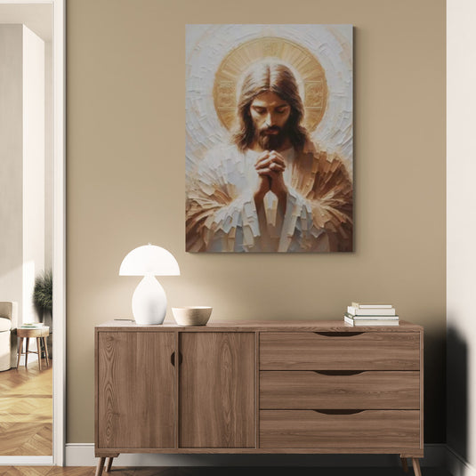 Cuadro de Jesús orando con manos juntas y luz divina