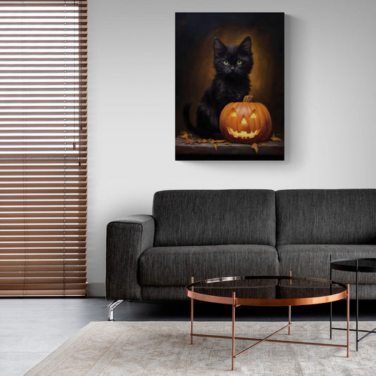 Gatito negro con calabaza de Halloween decorativa en cuadro artístico