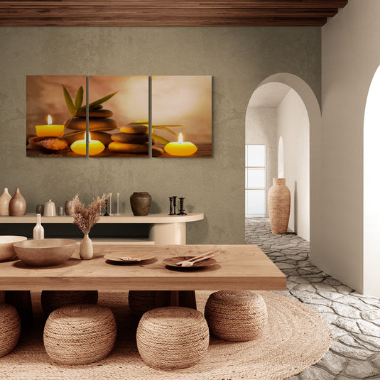 Cuadro moderno con velas y piedras apiladas para decoración de interiores.