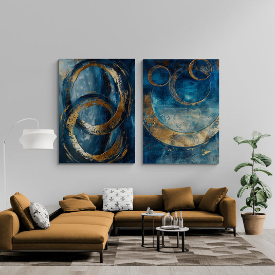 Cuadros abstractos modernos en tonos azul y dorado con diseño de anillos metálicos superpuestos, arte decorativo contemporáneo para sala u oficina
