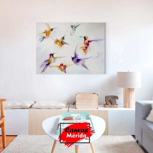 Cuadro decorativo: Pájaros en vuelo estilo acuarela en colores morados, naranjas y verdes sobre fondo clar