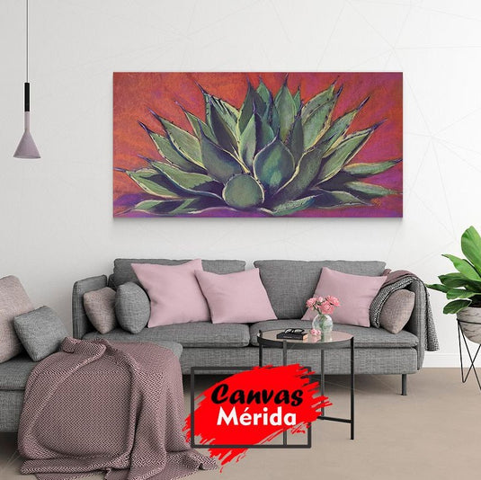 Cuadro decorativo de agave verde con fondo vibrante en tonos rojos, naranjas y morados
