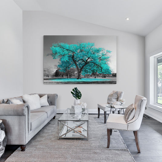 Cuadro decorativo en blanco y negro de un árbol con hojas turquesa destacadas