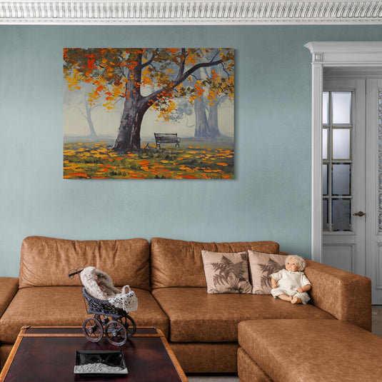 Cuadro_decorativo_de_otoño_con_hojas_caídas,_árbol_robusto_y_silla_solitaria_en_neblina