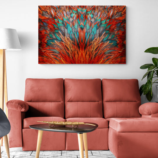 Cuadro decorativo con plumas en tonos rojos, naranjas, grises y turquesas