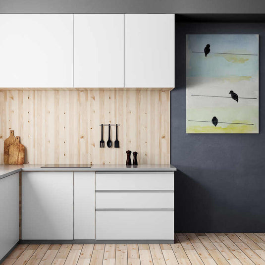 Cuadro decorativo con fondo pastel azul-verde-crema y siluetas de pájaros en líneas horizontales negras