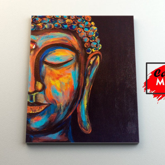 Pintura vibrante del rostro de Buda en tonos cálidos y fríos sobre fondo negro