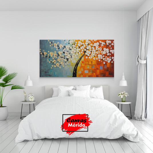 Cuadro decorativo con gradiente de azul a rojo pasando por amarillo y naranja, tronco oscuro y hojas en forma de flor blancas