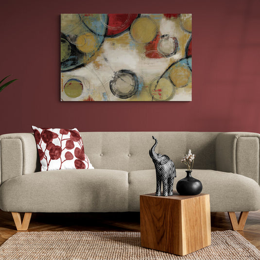 Cuadro abstracto con círculos superpuestos en tonos cálidos y fondo texturizado