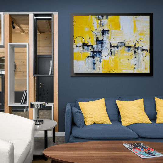 Pintura abstracta moderna en amarillo, azul y blanco con detalles en negro.