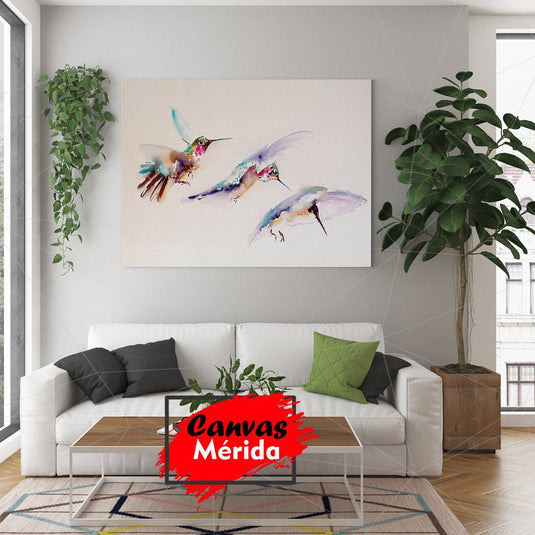 Cuadro decorativo de tres colibríes en acuarela sobre fondo blanco con tonalidades azules, lilas, rojo, café, verde y negro