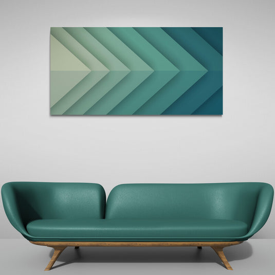 Cuadro decorativo minimalista con triángulos dirigidos hacia la izquierda en gradiente de verde a tonalidad esmeralda.