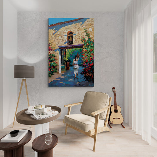 Mujer en patio de piedra con flores y campana