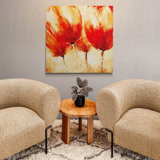 Pintura abstracta de tulipanes en tonos de rojo y naranja con textura expresiva