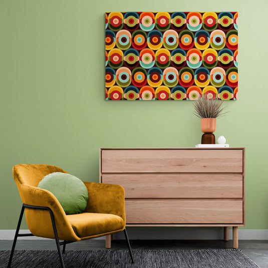 Cuadro retro geométrico con círculos concéntricos multicolor estilo años 70.
Preguntar a ChatGPT