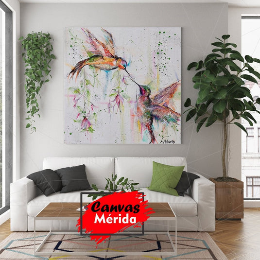 Acuarela de colibríes multicolores besándose sobre fondo blanco con matices rosas y verdes