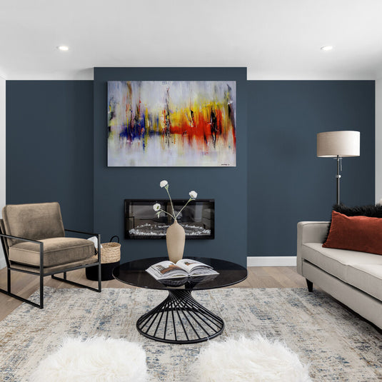 Cuadro abstracto colorido en tonos rojos, amarillos y azules