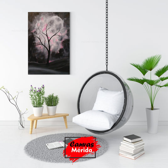 Silueta de árbol con hojas rosas sobre fondo negro con luna al fondo