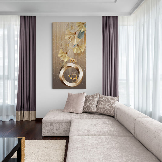 Arte decorativo con hojas de ginkgo doradas, ciervo y anillo geométrico en tonos dorados.