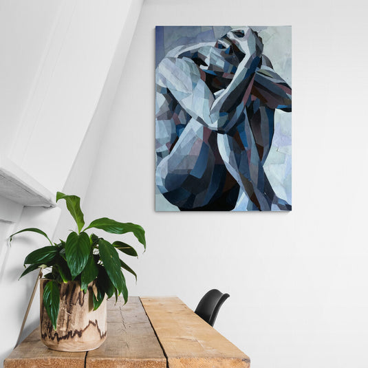 Cuadro decorativo abstracto de hombre pensativo en tonos azules y grises estilo geométrico moderno