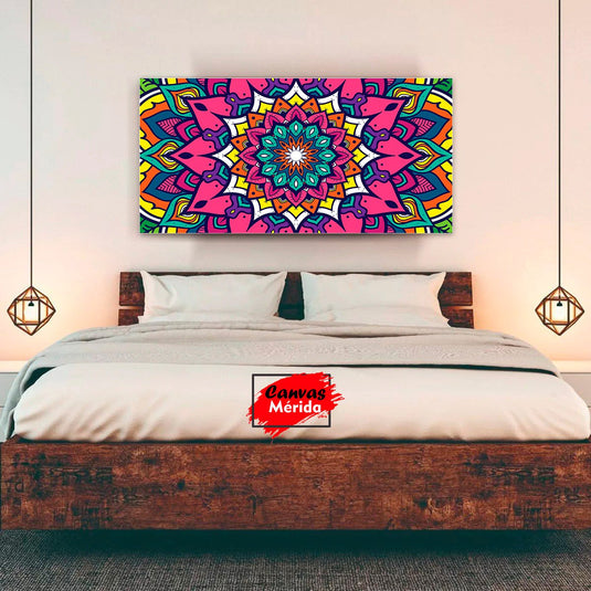 Mandala colorida con patrones geométricos y tonos vibrantes.