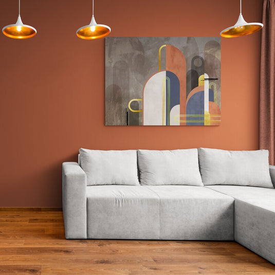 Cuadro decorativo minimalista con base en tonos café, destacando diseños geométricos en blanco, naranja, azul y amarillo.