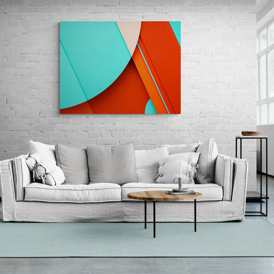 Cuadro decorativo con formas variadas en colores turquesa, beige, naranja y rojo dispuestas en múltiples posiciones.