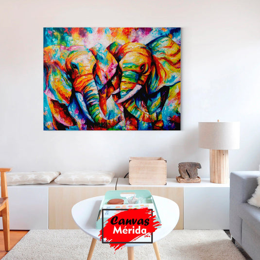 Elefantes en pareja rodeados de colores vibrantes como naranja, rojo, verde, rosa, fucsia, azul y café