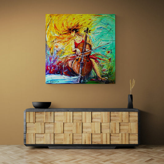 Cuadro abstracto moderno de mujer tocando violonchelo con colores vibrantes