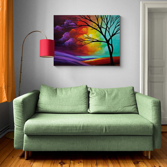 Cuadro_decorativo_abstracto_con_árbol_desnudo_y_fondo_colorido_en_tonalidades_moradas_naranjas_amarillas_y_turquesas