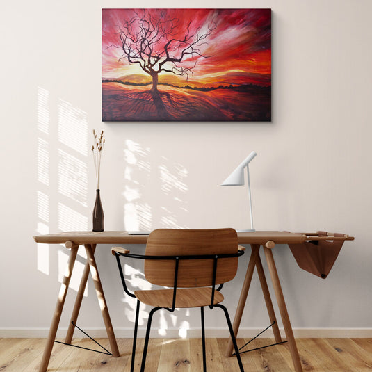 Cuadro decorativo: Árbol con ramas largas sin hojas en atardecer rojo y amarillo