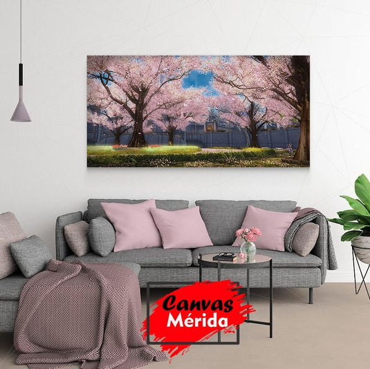 Jardín con cerezos en flor y cielo azul