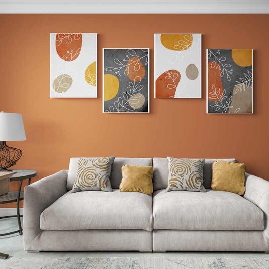 Set de cuadros decorativos con formas geométricas, colores terrosos y hojas estilizadas