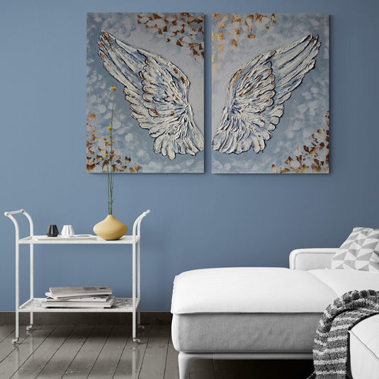 Díptico decorativo con alas de ángel en relieve sobre fondo azul con detalles dorados arte espiritual y texturizado ideal para ambientes serenos y elegantes