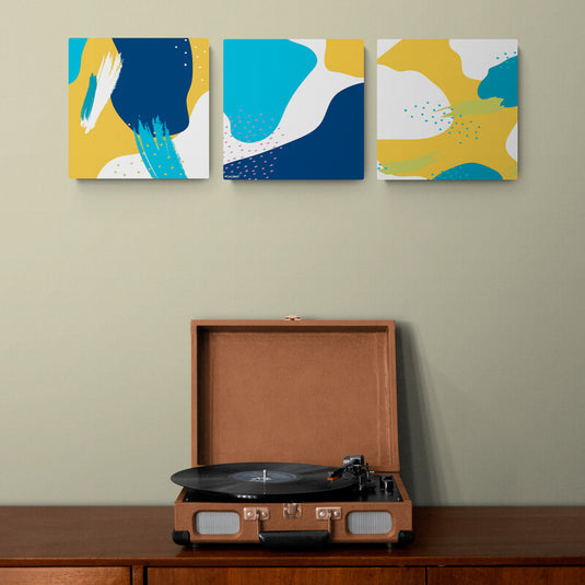 Tríptico Abstracto en Tonos Azules y Amarillos con Elementos de Salpicadura