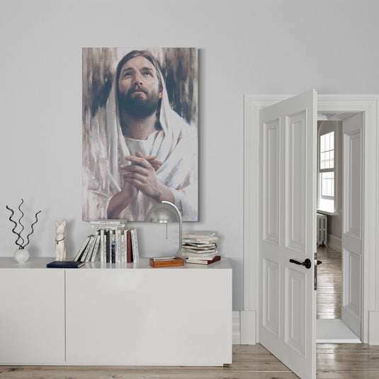 Retrato de Jesús en oración con mirada dirigida hacia el cielo.