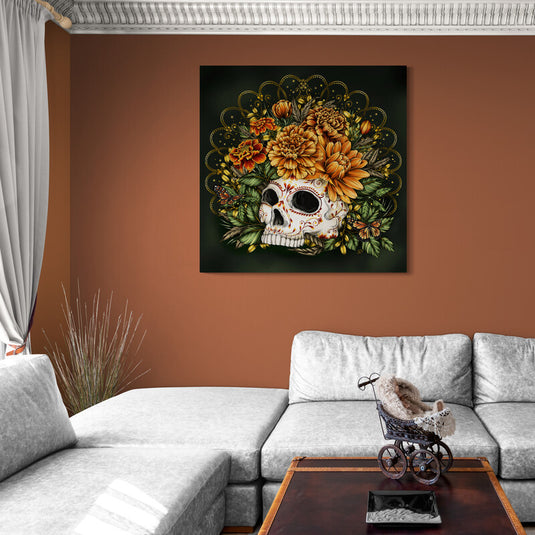 Calavera en fondo negro rodeada de flores de cempasúchil, hojas verdes y flores naranjas