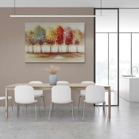 cuadro_decorativo_abstracto_pinos_colores_cálidos_rojo_amarillo_azul_toques_verdes_fondo_crema