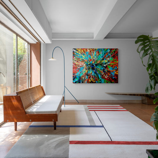 Cuadro abstracto moderno con explosión de colores en técnica de dripping