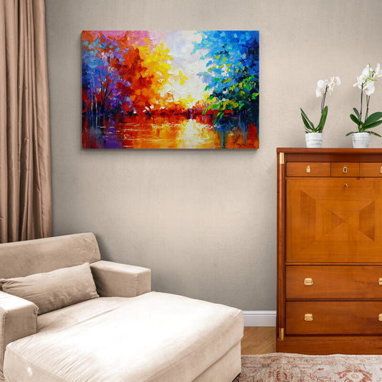 Cuadro al Óleo Decorativo Representando un Lago Rodeado de Árboles Vibrantes en Tonos Rojo, Naranja, Amarillo, Verde y Azul