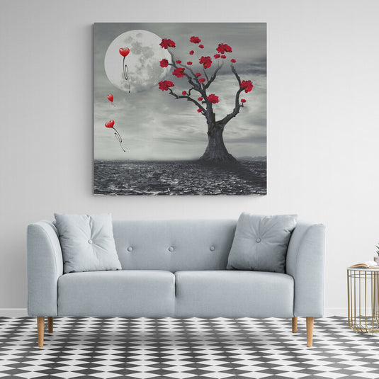 Árbol con Flores Rojas Desprendiéndose bajo Luna Llena en Fondo Blanco y Negro