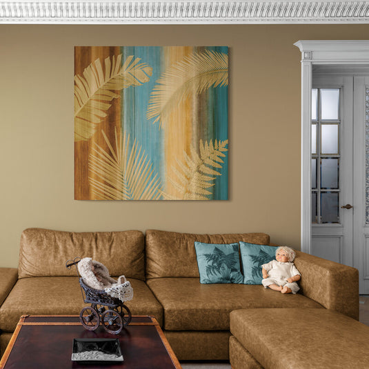 Cuadro decorativo tropical con hojas de palma doradas y fondo en tonos turquesa, beige y marrón