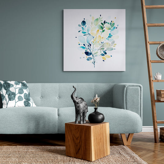 Cuadro decorativo con fondo blanco, ilustrando ramita con hojas en azul, verde y amarillo al estilo acuarela.