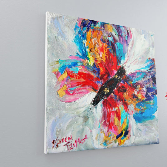 Pintura abstracta de mariposa en explosión de colores