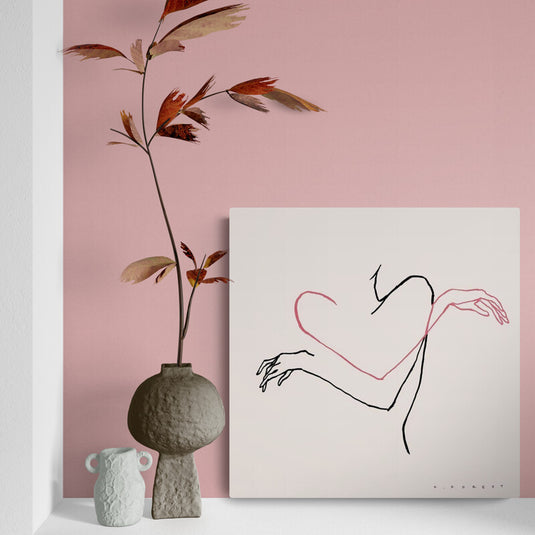 Cuadro decorativo Woman Line – arte minimalista de línea continua con figura femenina y forma de corazón en tonos negro y rosa para decoración moderna